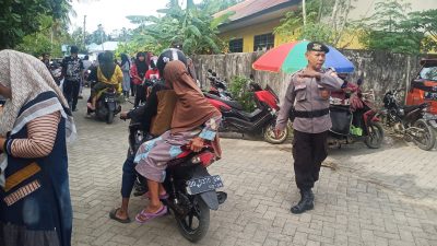 Polsek Tellu Siattinge Mengawal Aktivitas Masyarakat di Pasar Tokaseng