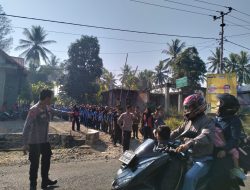 Polsek Lamuru polres Bone Lakukan Pengawalan Kegiatan Jalan Sehat diwilayahnya
