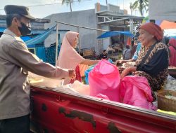 Aktifitas Jual Beli Meningkat di Bualan Ramadhan, Personel Polsek Amali Pengamanan di Pasar Tradisional
