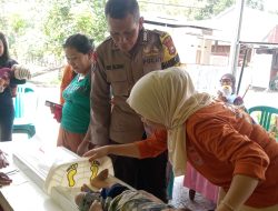 Sinergi dengan Tenaga Kesehatan, Bhabinkamtibmas Dukung Pelayanan Posyandu