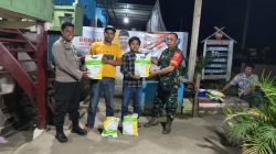 Bhabinkamtibmas Dampingi Kelompok Tani Menerima Bantuan Bibit Dari Pemerintah