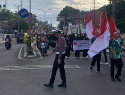 Sat Lantas Polres Bone Kawal Jalan Santai Satu Dekade Pesantren Madrasah Hafizh Qur’an