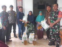 Bhabinkamtibmas Polsek Ulaweng dan Bhabinsa Dampingi Warga Penerimaan Bantuan Sembako