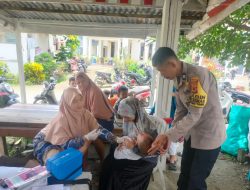 Bhabinkamtibmas Bajoe Aktif Dukung Kesehatan Balita Lewat Posyandu