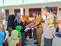 Aipda Andi Rusman Hadir Kawal Penyaluran Seragam Sekolah Gratis, Wujud Komitmen Polri Dukung Pendidikan