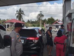 Anggota Polsek Kajuara Brigpol Murdifin Haswang Lakukan Pengamanan di Pertamina Lompu Kecamatan Kajuara Kabupaten Bone